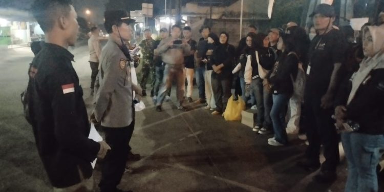 Kanit Binmas Polsek Cibatu Hadiri Kegiatan Penanaman Padi Gogo di Desa Cikadu