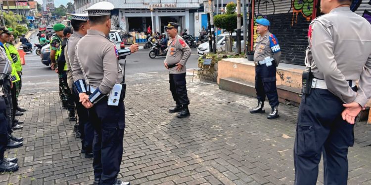 Ipda Andrias Pohan Pimpin Apel Kesiapsiagaan di Pos Pam Nataru Pasar Jumat