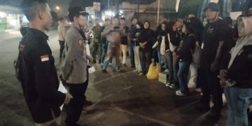 Kanit Binmas Polsek Cibatu Hadiri Kegiatan Penanaman Padi Gogo di Desa Cikadu