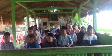 Polsek Pasawahan Melalui Kanit Binmas  Dampingi Kegiatan Santunan Anak Yatim Desa Salam Mulya 1447 H