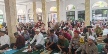 Hadiri Peringatan Maulid Nabi di Desa Karyamekar, Polsek Cibatu Jalin Kedekatan dengan Masyarakat